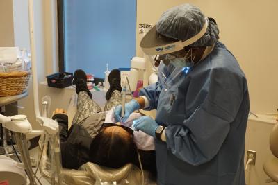 Working on dental patient